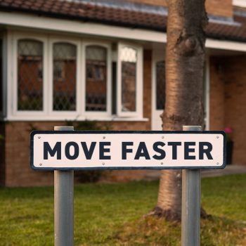 Fostering efficiency for estate agents in sales progression and chain pursuit tasks. | Image: Street signs reads "move faster" with black lettering on white background